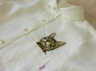 Illustration for article titled Internet Cats Make Boring Dress Shirts Better